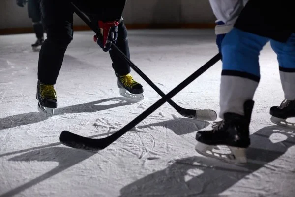 ice hockey players checking